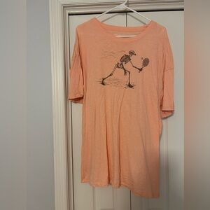 American Eagle Orange Skeleton Playing Tennis Graphic Tee